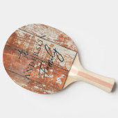 使い込まれた納屋の木に手書きの苗字 卓球ラケット (横)