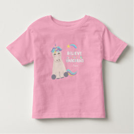 信じユニコーンの魔法のピンクの女のモノグラムの子 トドラーTシャツ