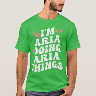 個性的なレトロでグルービーなデザイン アリアがアリアらしいことをしています Tシャツ