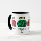 健康なおもしろいゴルファーのゴルフボール漫画のビタミンT型 マグカップ (正面左)