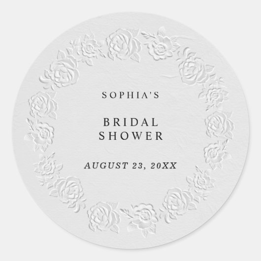偽のエンボス加工が施された白いバラのブライダルシャワー ラウンドシール (正面)