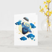 傘で飛んでいるかわいいフクロウ カード (黄色い花)