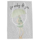 傘を差した妊婦さんの水玉模様 ミディアムペーパーバッグ (正面)