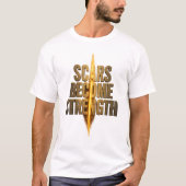 傷が強さを生む ゴールド モチベーション タイポグラフィ Tシャツ (正面)