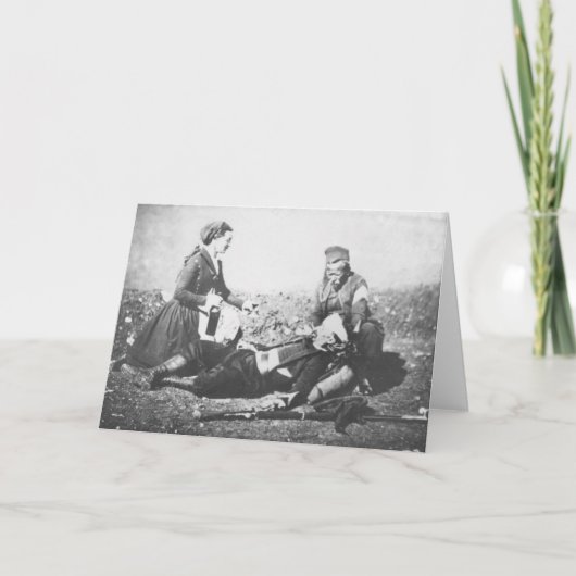 傷ついたナースを世話する男 カード (正面)