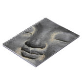 優しいブッダ顔石彫刻 ノートブック (左側)