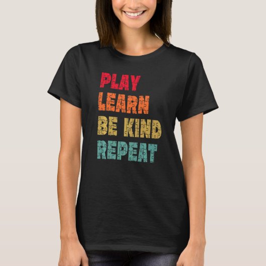 優しさと団結で広がる自閉症啓発 Play Learn Be Kind Repeat Tシャツ (正面)