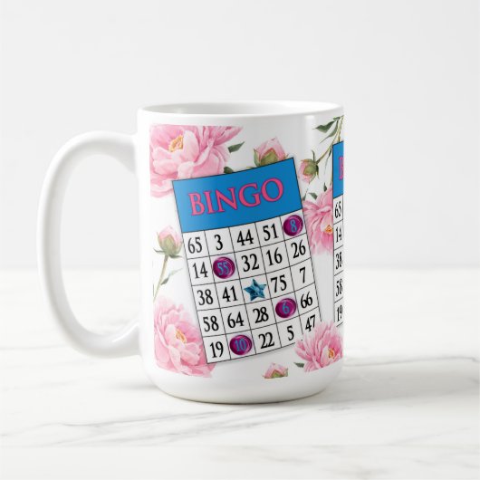優美なピンクの花を持つビンゴカード コーヒーマグカップ (左)