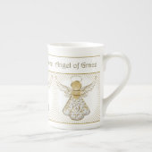 優美の線条細工パターンのエレガントなクリスマスの天使 ボーンチャイナマグカップ (右)