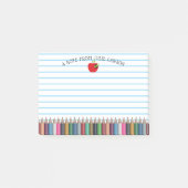 先生は着色された鉛筆の新学期Appleを示します ポストイット (正面)