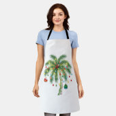 光とオルナムを持つ熱帯クリスマスパームツリー エプロン (着用した状態)