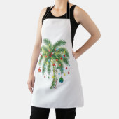 光とオルナムを持つ熱帯クリスマスパームツリー エプロン (インサイチュ)