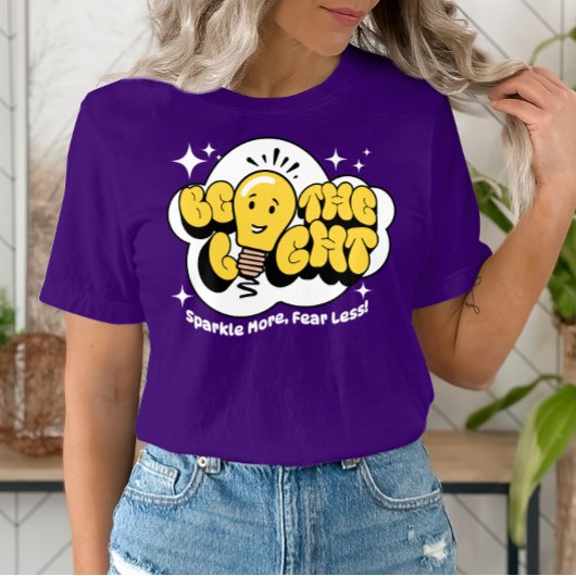 光を持ち、輝きを増し、恐怖を減らすやる気を起こさせる Tシャツ