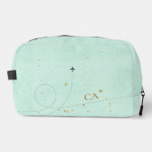 光ティール（緑がかった色）ミニマリストモノグラム金ゴールド飛行機 ドップキット (正面)