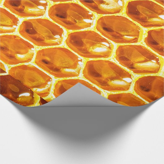 光沢がある黄色い蜜蜂の巣はパターンをタイルを張ります ラッピングペーパー (角)