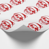 光沢のあるサンタの帽子の赤いスカル ラッピングペーパー (角)