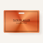 光沢のあるメタリックオレンジ色のテクスチャ黒のアクセント バッジ (正面)