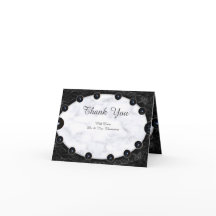 光沢のある白と黒の大理石球