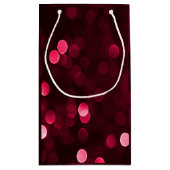 光沢のある赤いクリスマスライト《写真》ぼけ味メリークリスマス スモールペーパーバッグ (裏面)