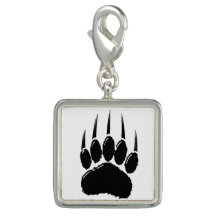 光沢のある黒いクマの前足印刷