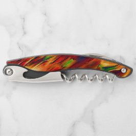 光沢は赤からオレンジまで、小さな緑に染まった ソムリエナイフ