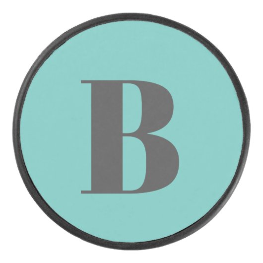 光独占的ティール（緑がかった色）グレーモノグラムイニシャル文字 アイスホッケーパック (正面)