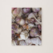 全体のニンニク球根とピンクのニンニクの背景 ジグソーパズル (縦)