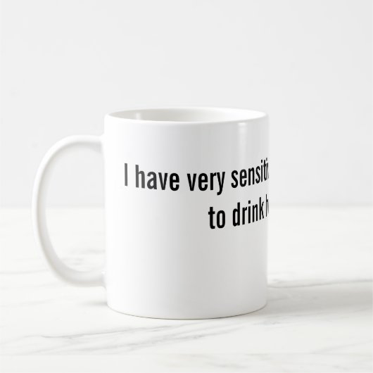 公式FMLのマグ: 歯 コーヒーマグカップ (左)