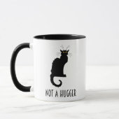 内向的な反おもしろい社会的猫ではない マグカップ (左)