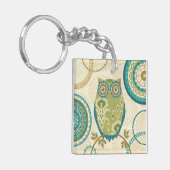 円のデザインの装飾的なフクロウ キーホルダー (正面左)