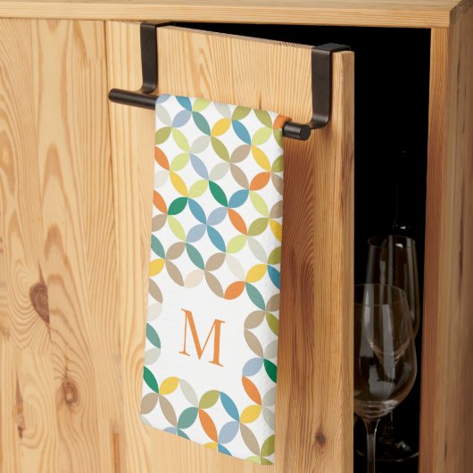 円形の四分模様の暖かいトーンのモノグラム キッチンタオル (三つ折り)