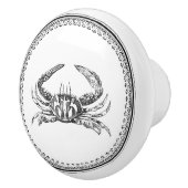 円形の装飾枠内のカニ セラミックノブ (右)