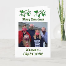 写真付きの熱狂する集団から1年