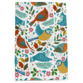 冬とカラフルクリスマスのシンボルを持つ鳥 ミディアムペーパーバッグ (正面)