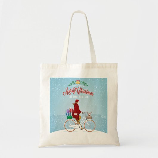 冬のクリスマスに自転車に乗った女性 トートバッグ (正面)
