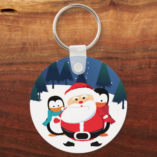 冬のシーンでかわいいサンタクロースとペンギン キーホルダー (正面)