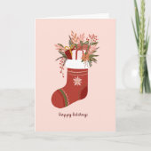 冬のストッキングとギフトボックス、花のクリスマス カード (正面)