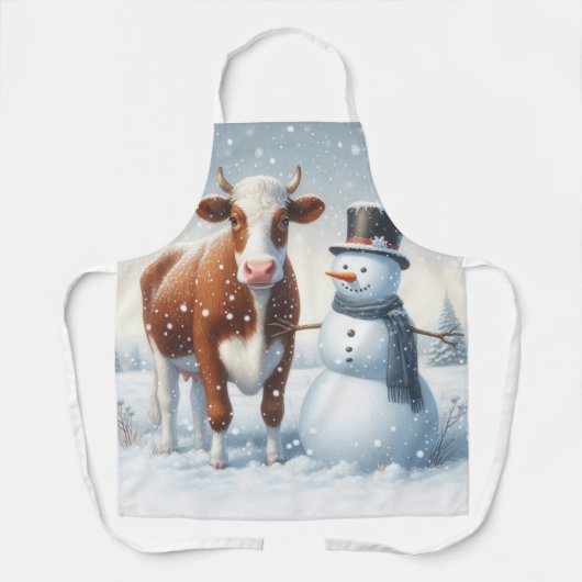 冬のフィールドでかわいい牛と雪だるま エプロン (正面)