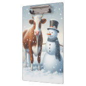 冬のフィールドでかわいい牛と雪だるま クリップボード (左)
