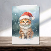 冬の家族のサンタハットにクリスマス猫 カード