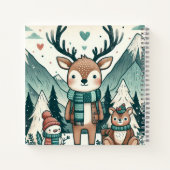 冬の放浪者 – 雪の中で居心地の良い鹿の家族 ノートブック (裏面)