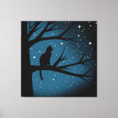 冬の星空の夜に木に猫 キャンバスプリント (正面)