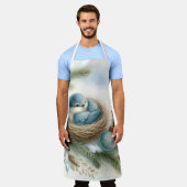 冬の松にオーナメントのあるブルーバードネスト エプロン (着用した状態)