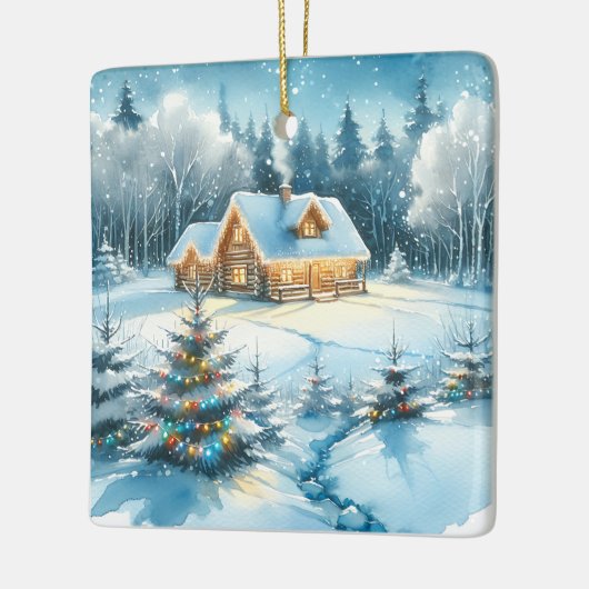冬の森の中の穏やかなログキャビン セラミックオーナメント (左)