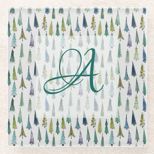 冬の森の松の木のパターンのモノグラムの装飾 ガラスコースター (正面)