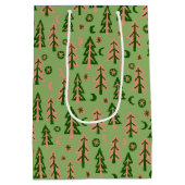 冬の森の松の木月の星模様の緑 ミディアムペーパーバッグ (裏面)