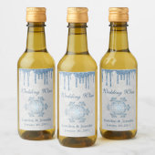 冬の結婚式のスノーフレークとブルーのグリッターの好意 ワインラベル (ボトル)