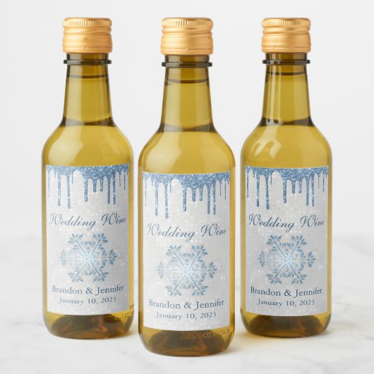 冬の結婚式のスノーフレークとブルーのグリッターの好意 ワインラベル (ボトル)