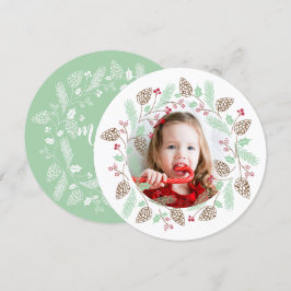 冬の赤と緑の松とホリーデイのクリスマスリース 招待状