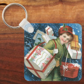 冬の雪に贈り物を贈るヴィンテージクリスマス キーホルダー (正面)